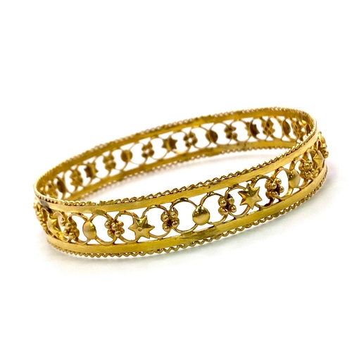 132 - A vintage, early 1960s, 14 K yellow gold bangle, internal diameter: 66 mm, weight: 17.2 g.