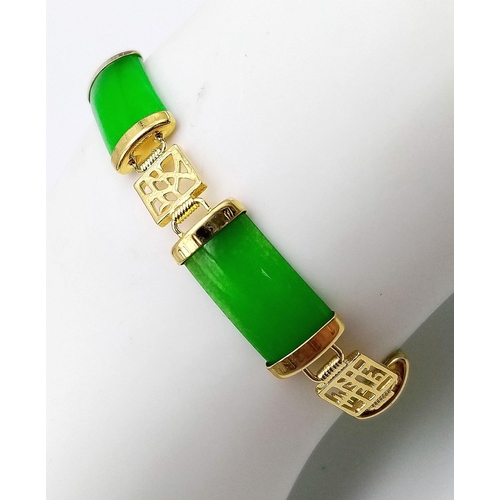 216 - A traditional, high quality, Chinese, gold filled bracelet with green jade, and Chinese characters b... 