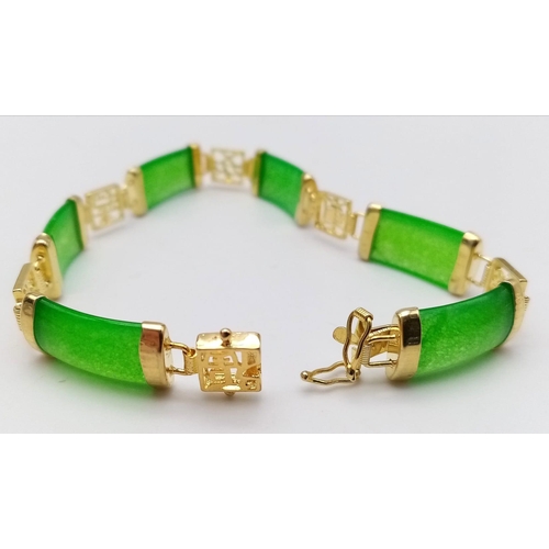 216 - A traditional, high quality, Chinese, gold filled bracelet with green jade, and Chinese characters b... 