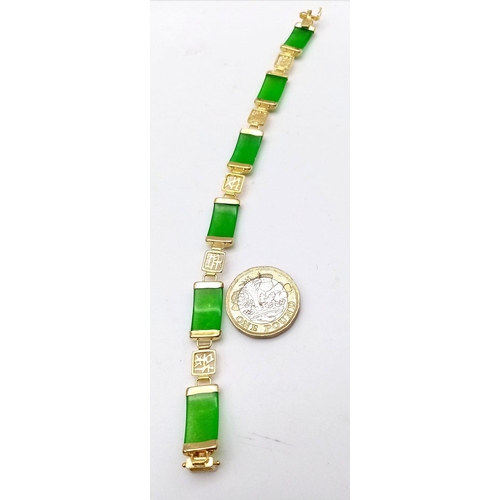 216 - A traditional, high quality, Chinese, gold filled bracelet with green jade, and Chinese characters b... 