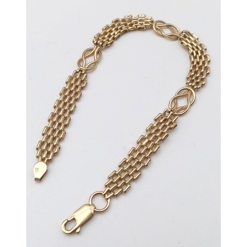 444 - A 9K Yellow Gold Matrix Link Bracelet with Interlocking Spacers. 18cm. 5.94g weight