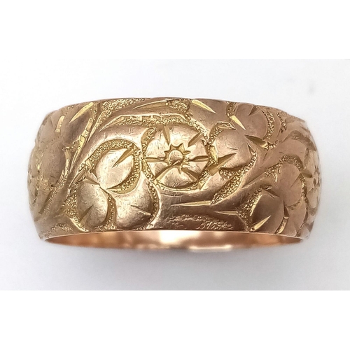 446 - A Vintage 9K Yellow Gold Band Ring with Engraved Floral Design. Size M. 3.2g weight.