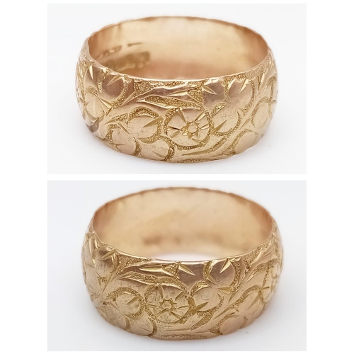 446 - A Vintage 9K Yellow Gold Band Ring with Engraved Floral Design. Size M. 3.2g weight.