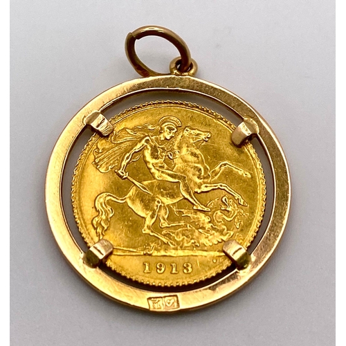 176 - A 1913 George V 22K Gold Half Sovereign in a 9K Gold Casing. 6.22g total weight.