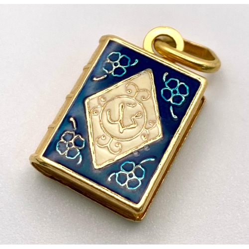 227 - An 18K Gold and Enamel Quran Book Pendant/Charm. 2.5cm.
3.12g weight.