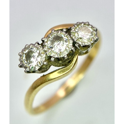 344 - A Vintage 18K Yellow Gold and Platinum Bravingtons Three Diamond Crossover Ring. Size P. 3.51g total... 