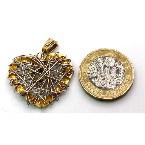 407 - A Vintage Unique 14K Yellow and White Gold 'Barbed Wire' Effect Heart Pendant. 3.5cm. 3.83g weight.