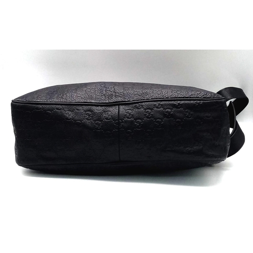 76 - A Gucci Monogram Guccissima Medium Black Leather Handbag, Black Canvas Interior with Interior Zip an... 