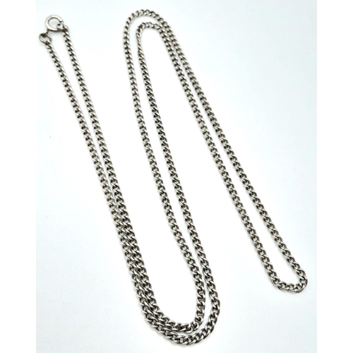 770 - A 60cms SOLID SILVER CURB CHAIN .  6.8gms