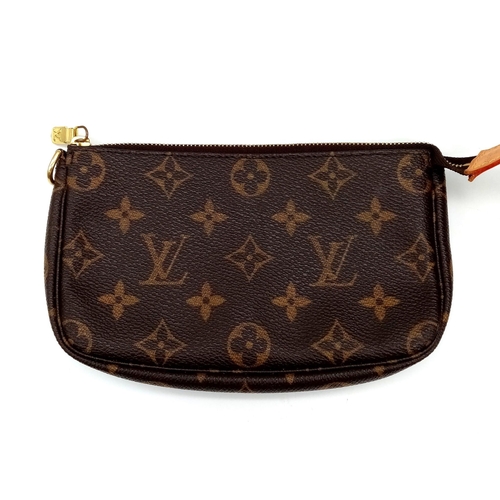 90 - A Louis Vuitton Bucket Tote Bag, Monogram Printed Brown Canvas, Two Interior Pockets and a Small Coi... 