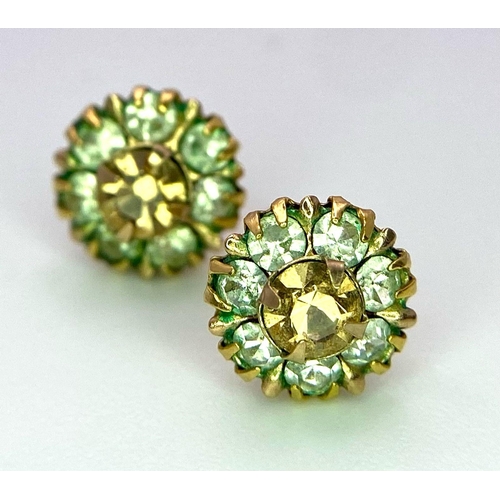 1791 - Two Pairs of 9K Gold White and Green Stone Stud Earrings. No backs. 1.92g total weight.