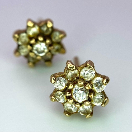 1791 - Two Pairs of 9K Gold White and Green Stone Stud Earrings. No backs. 1.92g total weight.