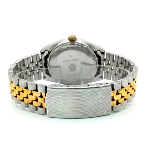 131 - A West End Watch Co. Prima Automatic 25 Jewel Gents Watch. Two tone bracelet and case - 37mm. Gold t... 