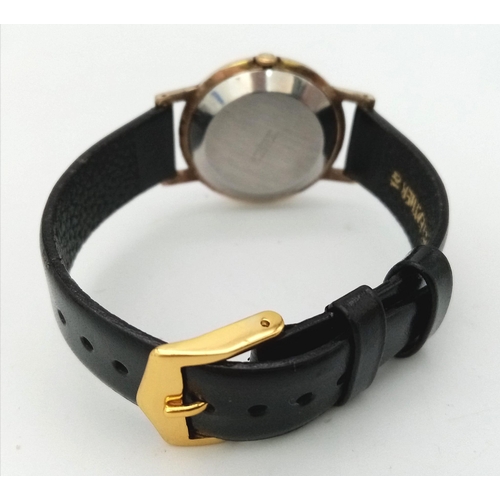 765 - A Vintage Oris Super 17 Jewels Mechanical Gents Watch. Black leather strap. Two tone case - 33mm. Me... 