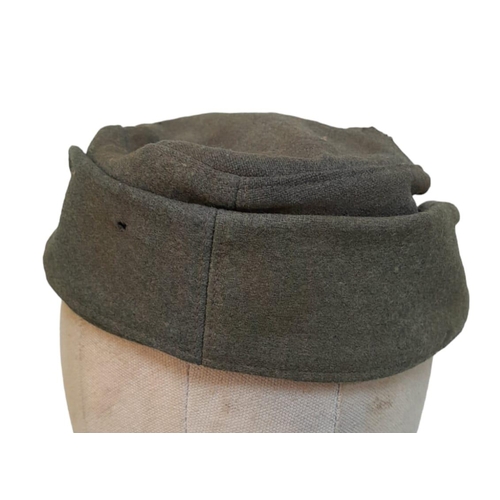 197 - 3rd Reich Waffen SS M43 Cap. very small cut on the top. A real “Been There” item.