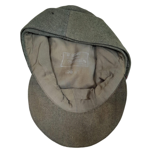 197 - 3rd Reich Waffen SS M43 Cap. very small cut on the top. A real “Been There” item.