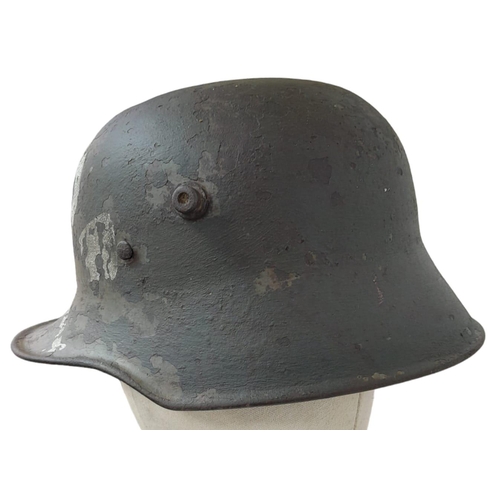 246 - Pre WW2-German Friekorps Helmet. Imperial German/Austrian M18 shell with transitional period
liner. ... 