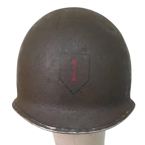 323 - WW2 US Fixed Bale M1 Helmet with insignia of the 1st Infantry Division. “The Big Red 1”.