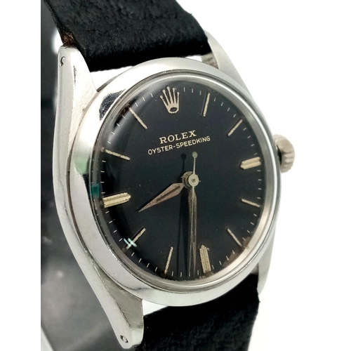 369 - A ROLEX VINTAGE UNISEX OYSTER- SPEEDKING WATCH IN STAINLESS STEEL WITH BLACK LEATHER STRAP . 30mm