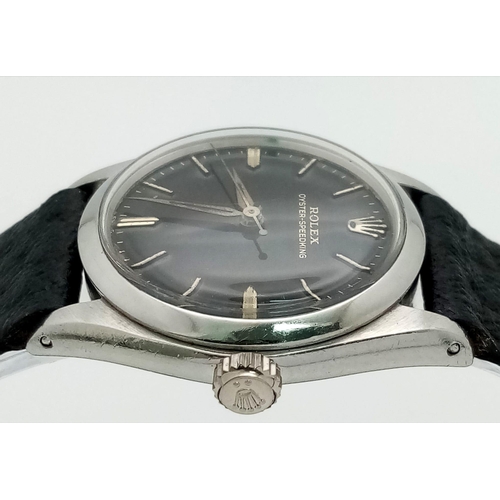 369 - A ROLEX VINTAGE UNISEX OYSTER- SPEEDKING WATCH IN STAINLESS STEEL WITH BLACK LEATHER STRAP . 30mm