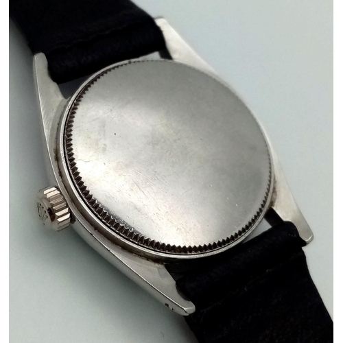 369 - A ROLEX VINTAGE UNISEX OYSTER- SPEEDKING WATCH IN STAINLESS STEEL WITH BLACK LEATHER STRAP . 30mm