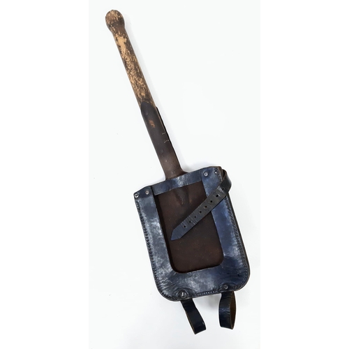 415 - WW2 German Entrenching Spade in leather pannier. Dated 1944.