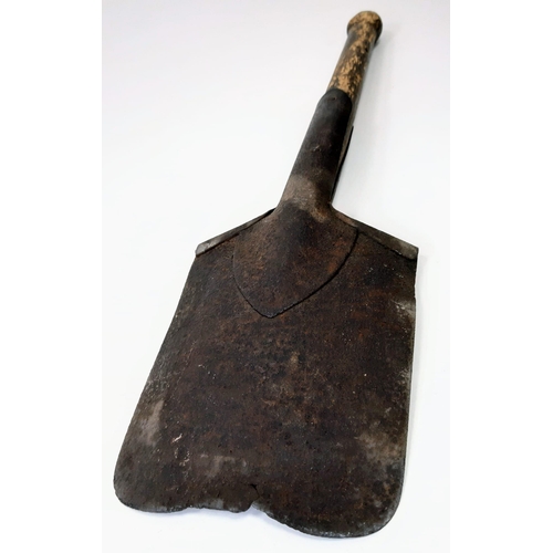 415 - WW2 German Entrenching Spade in leather pannier. Dated 1944.