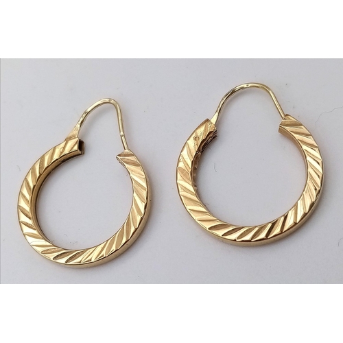 480 - A Pair of 9K Yellow Gold Hoop Earrings with Ridged Decoration. 2.85g total weight.