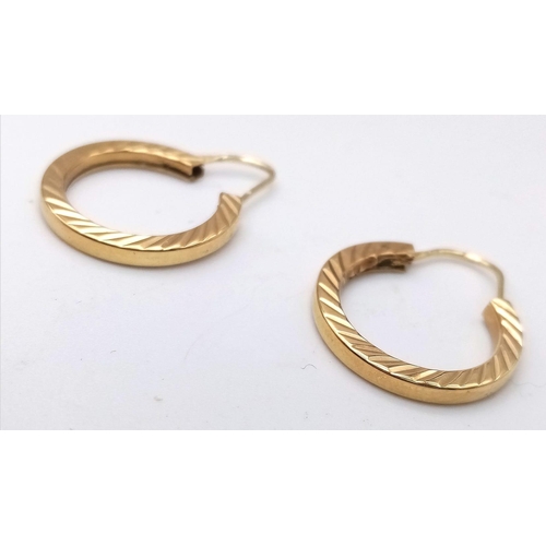 480 - A Pair of 9K Yellow Gold Hoop Earrings with Ridged Decoration. 2.85g total weight.