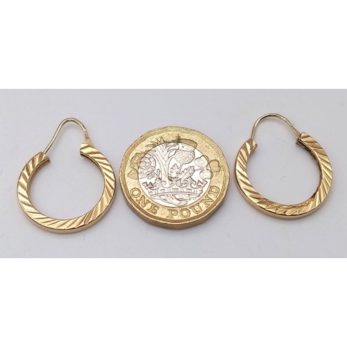 480 - A Pair of 9K Yellow Gold Hoop Earrings with Ridged Decoration. 2.85g total weight.