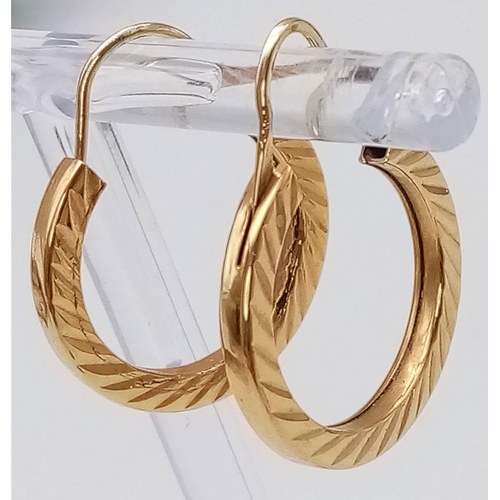 480 - A Pair of 9K Yellow Gold Hoop Earrings with Ridged Decoration. 2.85g total weight.