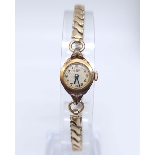 65 - A Vintage Bimesa 17 Jewel 18K Gold Cased Mechanical Watch. Expandable gilded bracelet. 18k gold case... 
