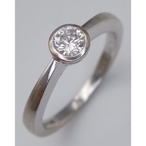 106 - A 18K WHITE GOLD DIAMOND SOLITAIRE RING 0.26CT 3.25G SIZE K