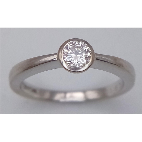 106 - A 18K WHITE GOLD DIAMOND SOLITAIRE RING 0.26CT 3.25G SIZE K