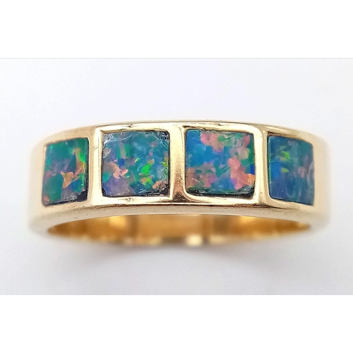 254 - A 14K YELLOW GOLD OPAL SET RING.  4.9G. SIZE Q