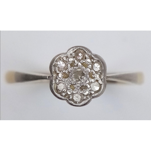 296 - A 18K YELLOW GOLD & PLATINUM VINTAGE CLUSTER RING IN THE FLORAL DESIGN 3.1G SIZE R