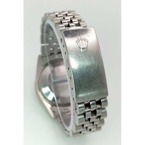 355 - A LADIES ROLEX DRESS WATCH WITH DIAMOND NUMERALS AND BEZEL , MOTHER OF PEARL DIAL AND AUTOMATIC MOVE... 