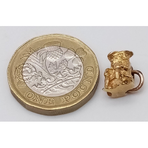 505 - A 9K YELLOW GOLD TOBY JUG CHARM. 2.3G.