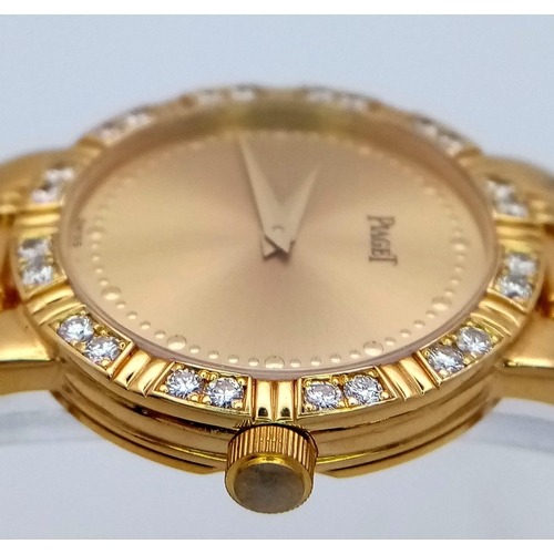 173 - A STUNNING PIAGET 18K GOLD LADIES DRESS WATCH WITH DIAMOND BEZEL , QUARTZ MOVEMENT . GOLDTONE DIAL A... 