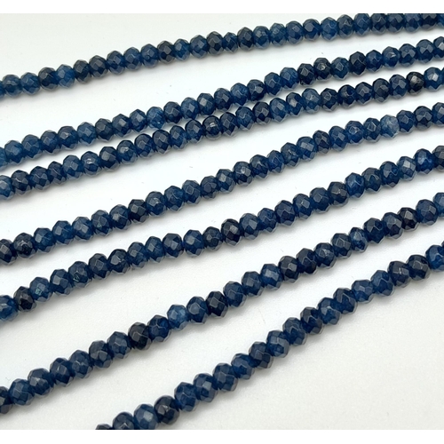 174 - A magnificent, seven row necklace with faceted dark blue sapphire rondelles. Length: 43-54 cm, weigh... 