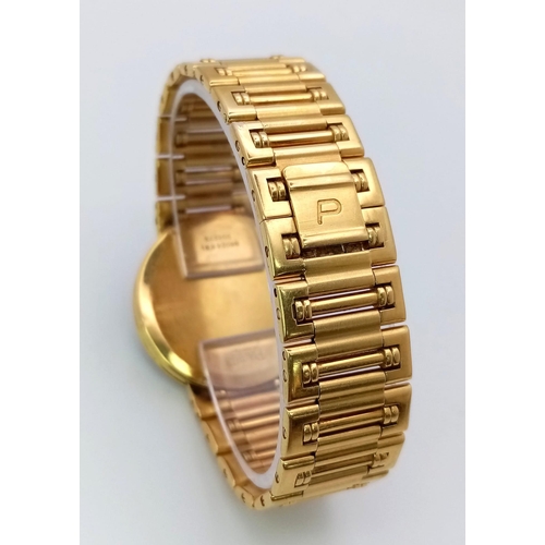 237 - A PIAGET 18K GOLD LADIES DRESS WATCH WITH DIAMOND BEZEL , GOLD HANDS ON A BLACK DIAL , QUARTZ MOVEME... 