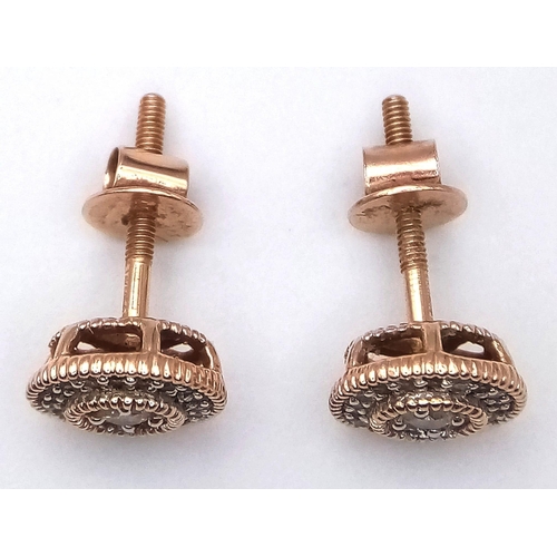 240 - A PAIR OF 14K ROSE GOLD DIAMOND SET STUD EARRINGS. 2G. 0.30CT