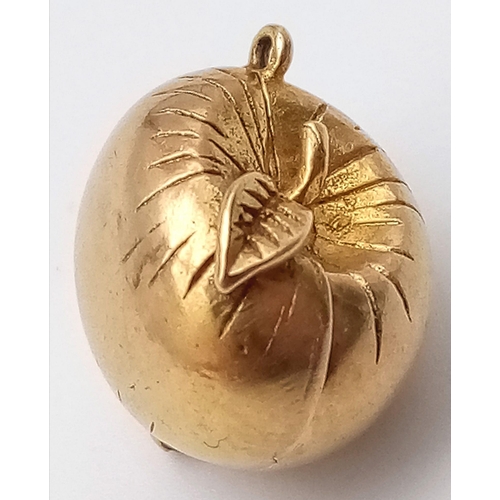 289 - A 9K YELLOW GOLD APPLE CHARM WHICH OPENS TO REVEAL ADAM & EVE INSIDE!  4.9G. 12MM.