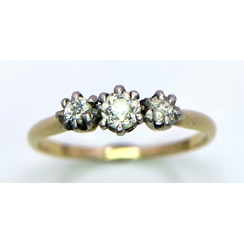 303 - A 18K YELLOW GOLD DIAMOND 3 STONE RING 0.25CT 1.9G SIZE N 1/2