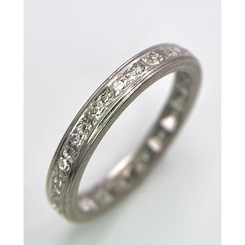 317 - A 18K WHITE GOLD DIAMOND SET FULL ETERNITY RING 0.25CT 2.9G SIZE M