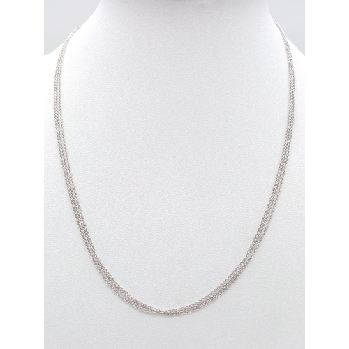 365 - A 18k white gold triple row necklace, 16