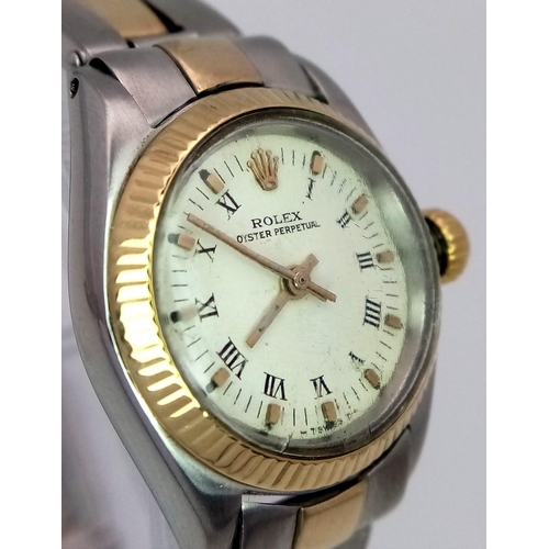 370 - A VINTAGE LADIES ROLEX OYSTER PERPETUAL BI-METAL WRIST WATCH WITH ROMAN NUMERALS AND WHITE DIAL .  2... 