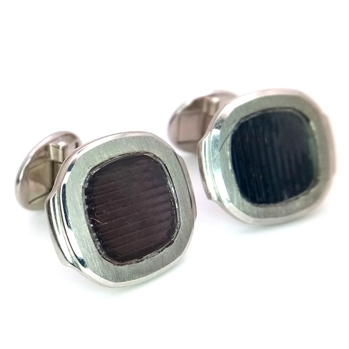 390 - A PAIR OF 18K WHITE GOLD PATEK PHILIPPE DESIGNER CUFFLINKS.   23gms