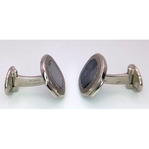 390 - A PAIR OF 18K WHITE GOLD PATEK PHILIPPE DESIGNER CUFFLINKS.   23gms