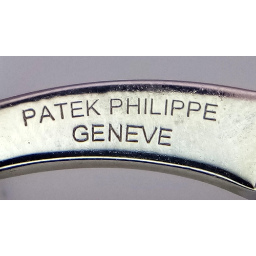 390 - A PAIR OF 18K WHITE GOLD PATEK PHILIPPE DESIGNER CUFFLINKS.   23gms